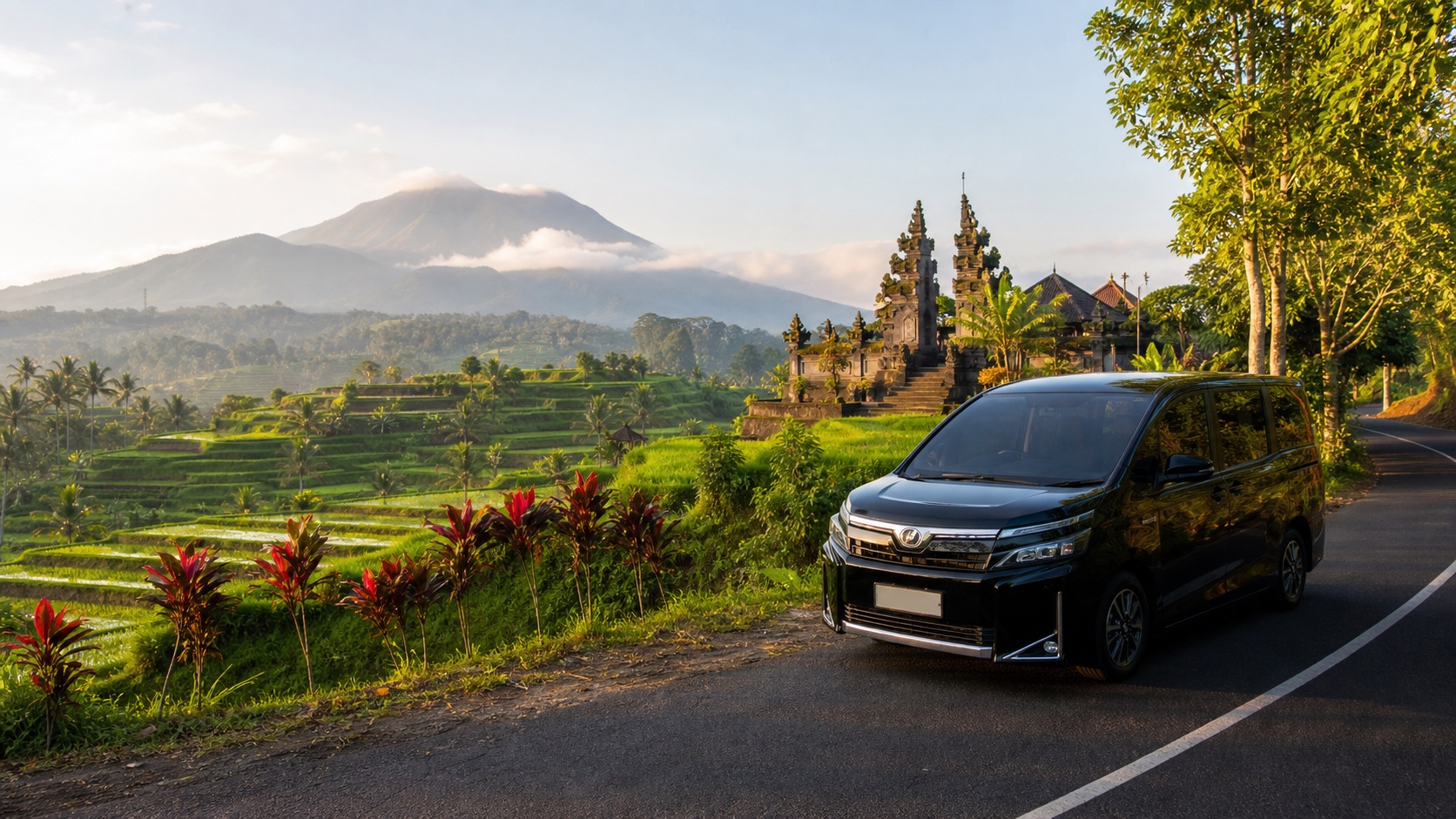 Private Bali tour vehicle overlooking rice terraces and a Balinese temple
